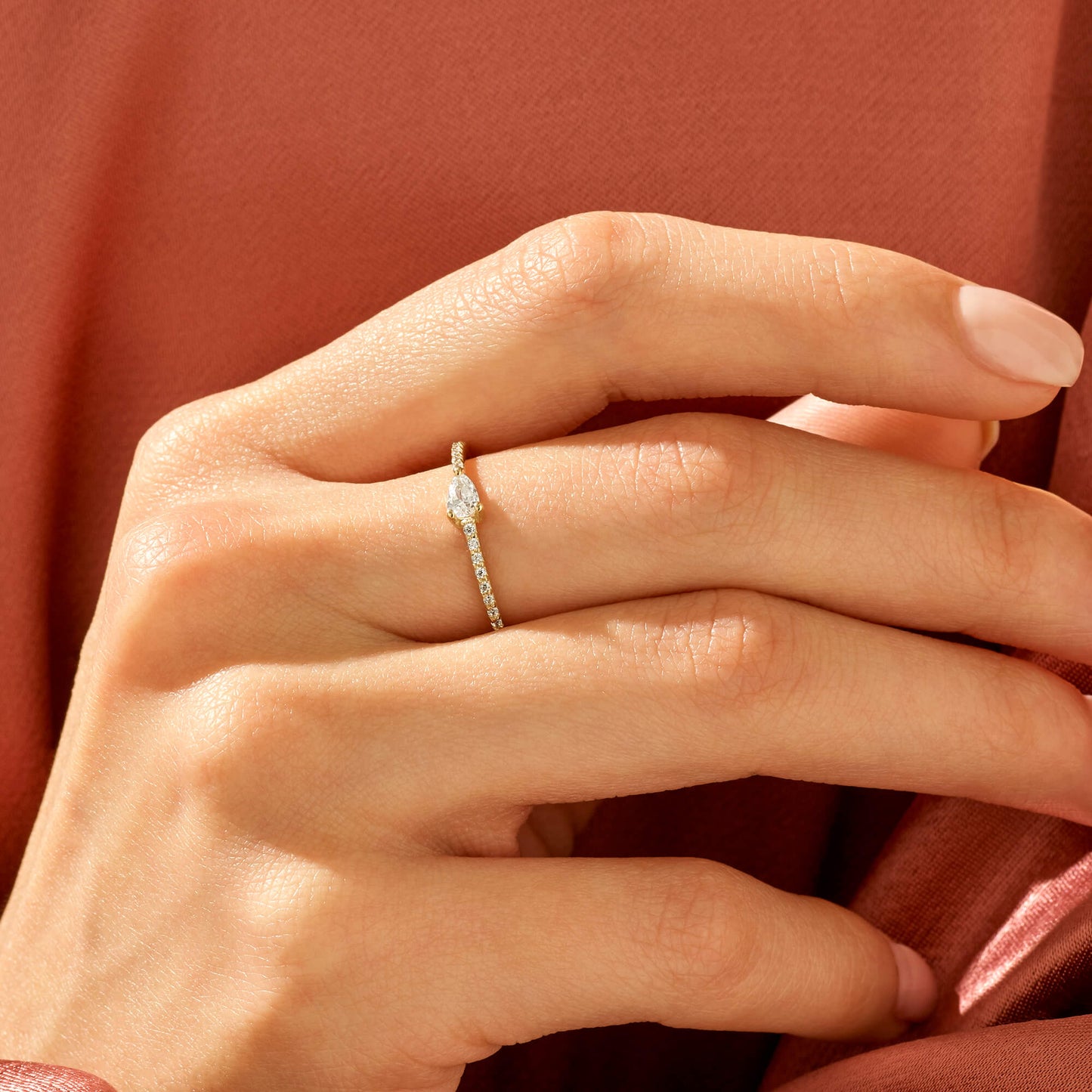 Half Eternity Pear Ring in Gold