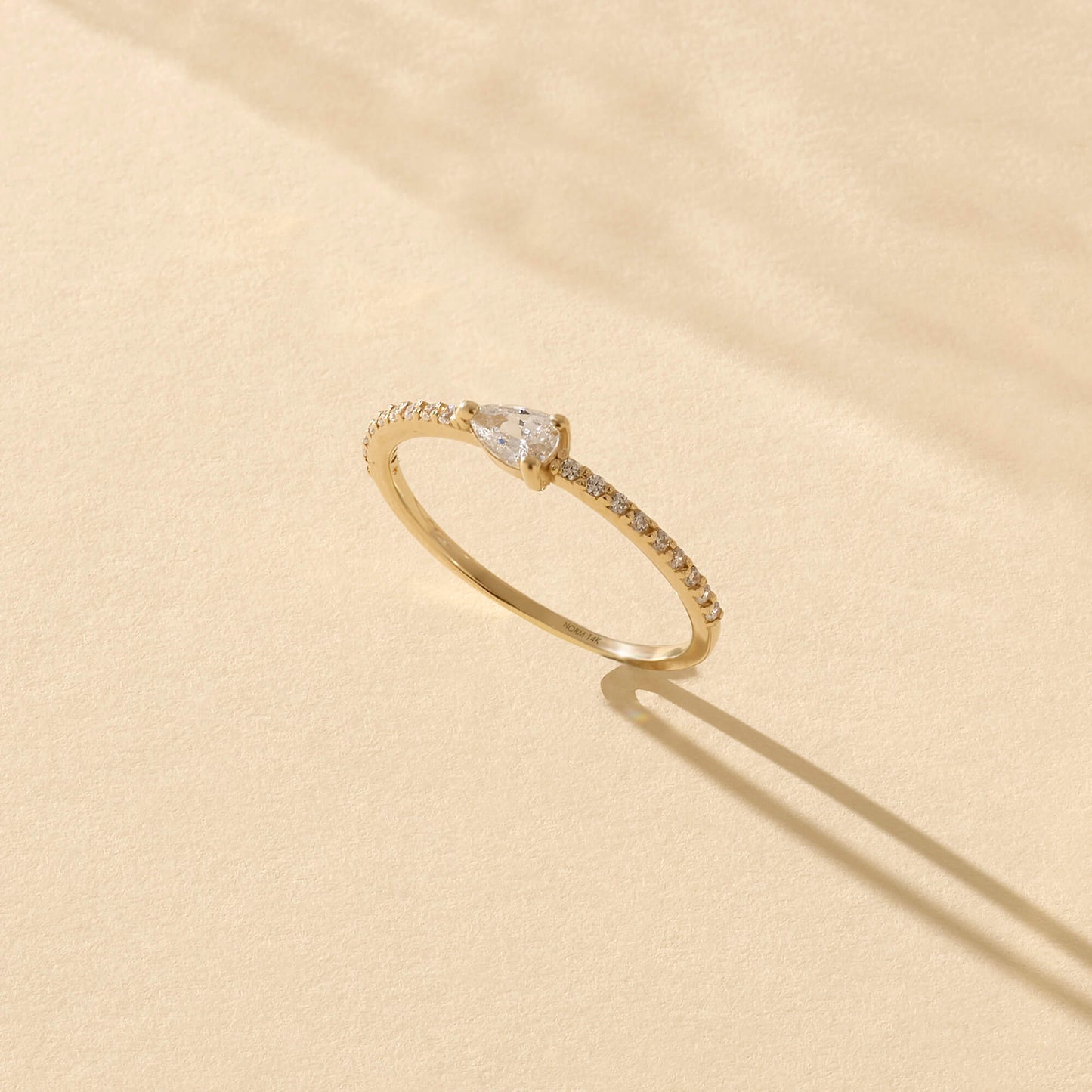 Half Eternity Pear Ring in Gold
