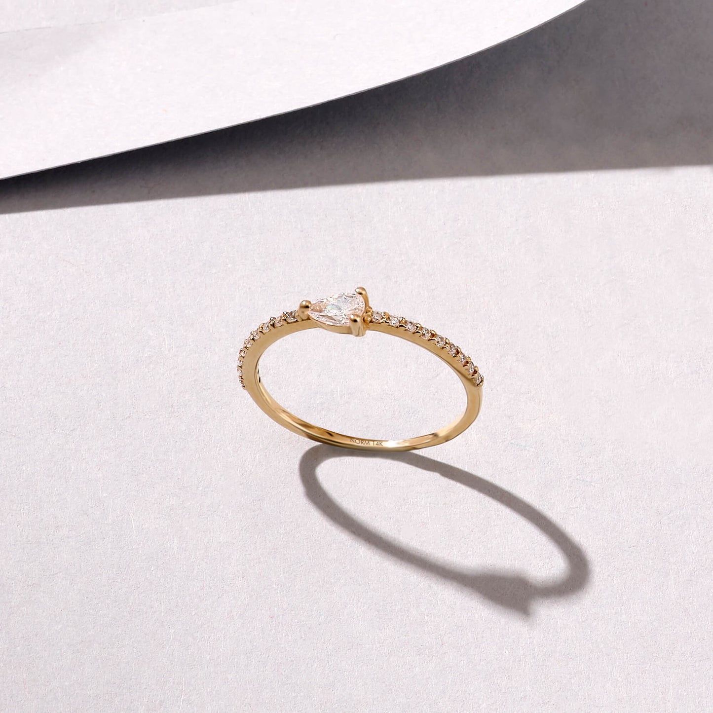Half Eternity Pear Ring in Gold