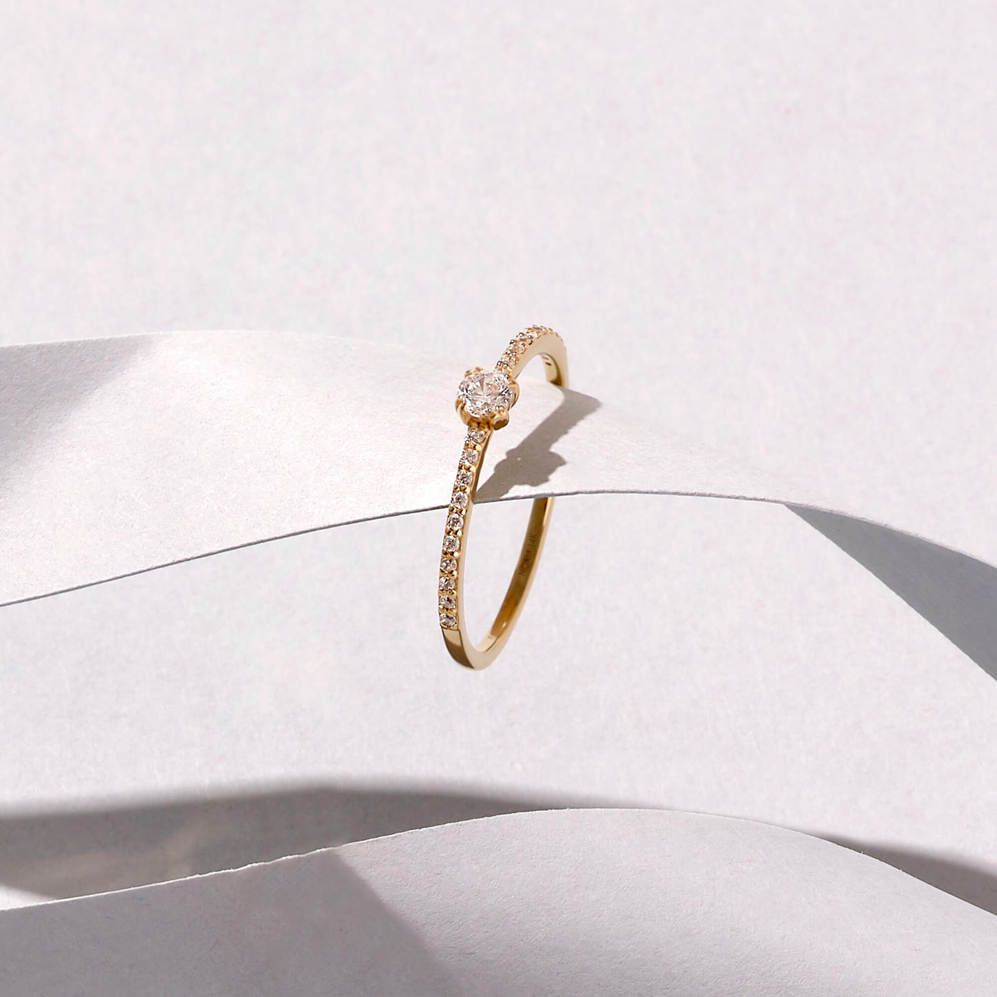 Half Eternity Solitaire Ring in Gold