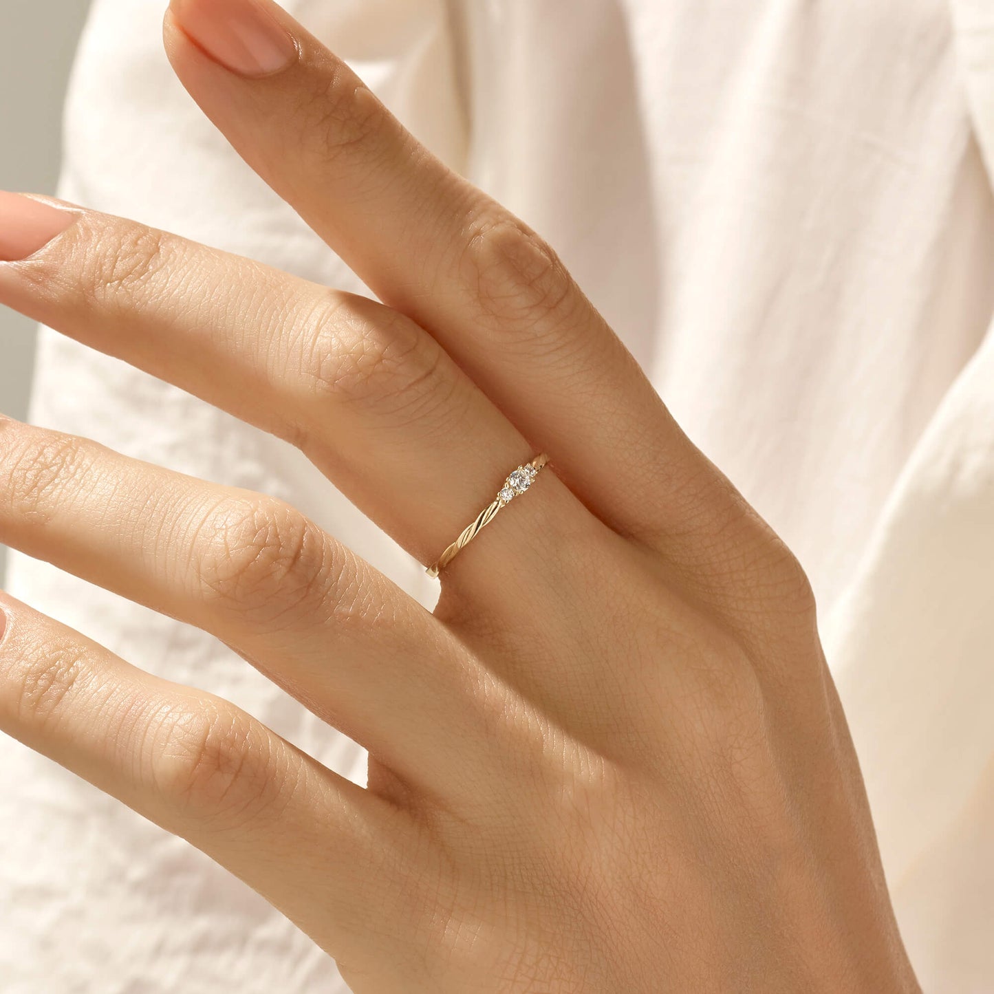 Diamond Minimal Twisted Solitaire Ring in Gold