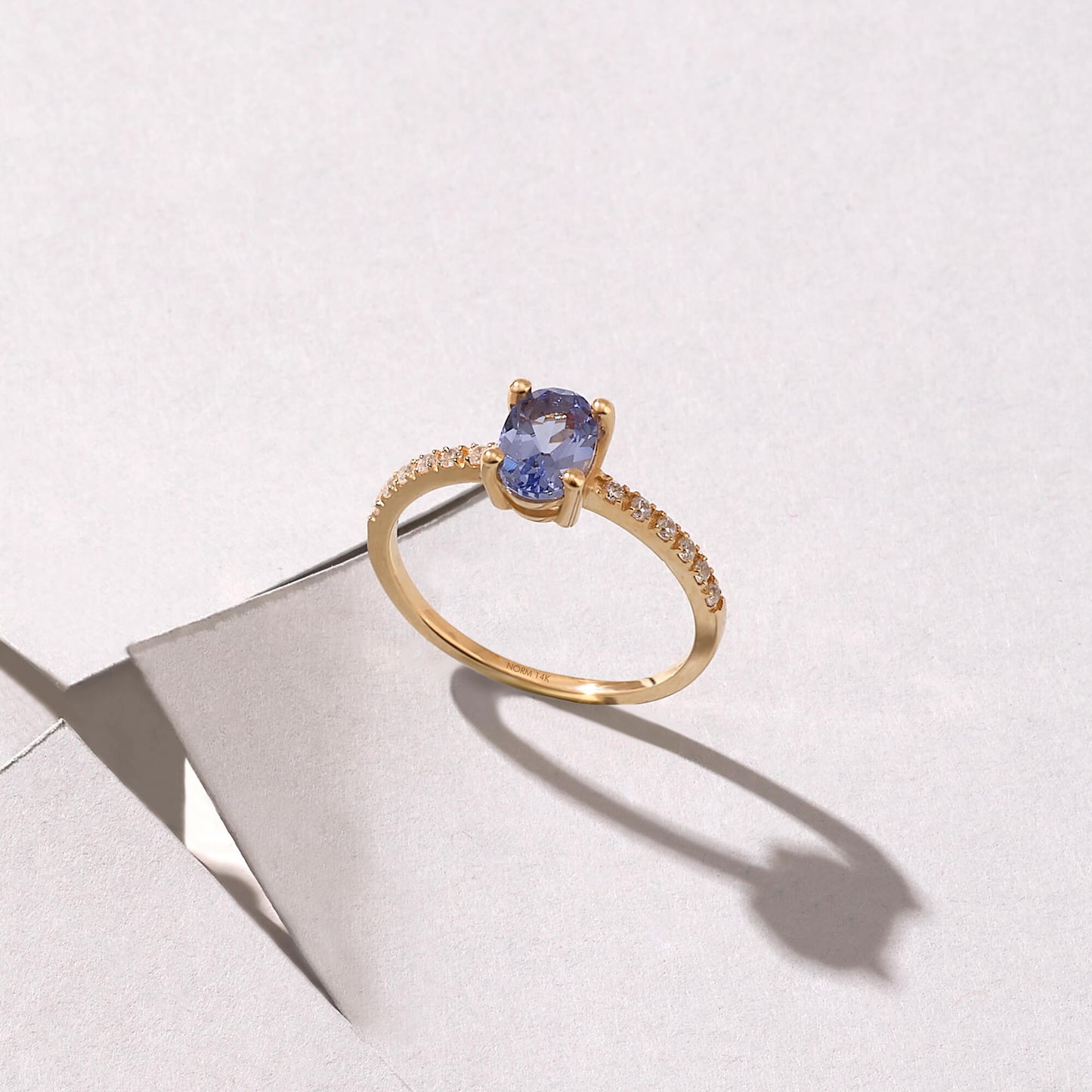 Tanzanite Oval Solitaire Ring in Gold