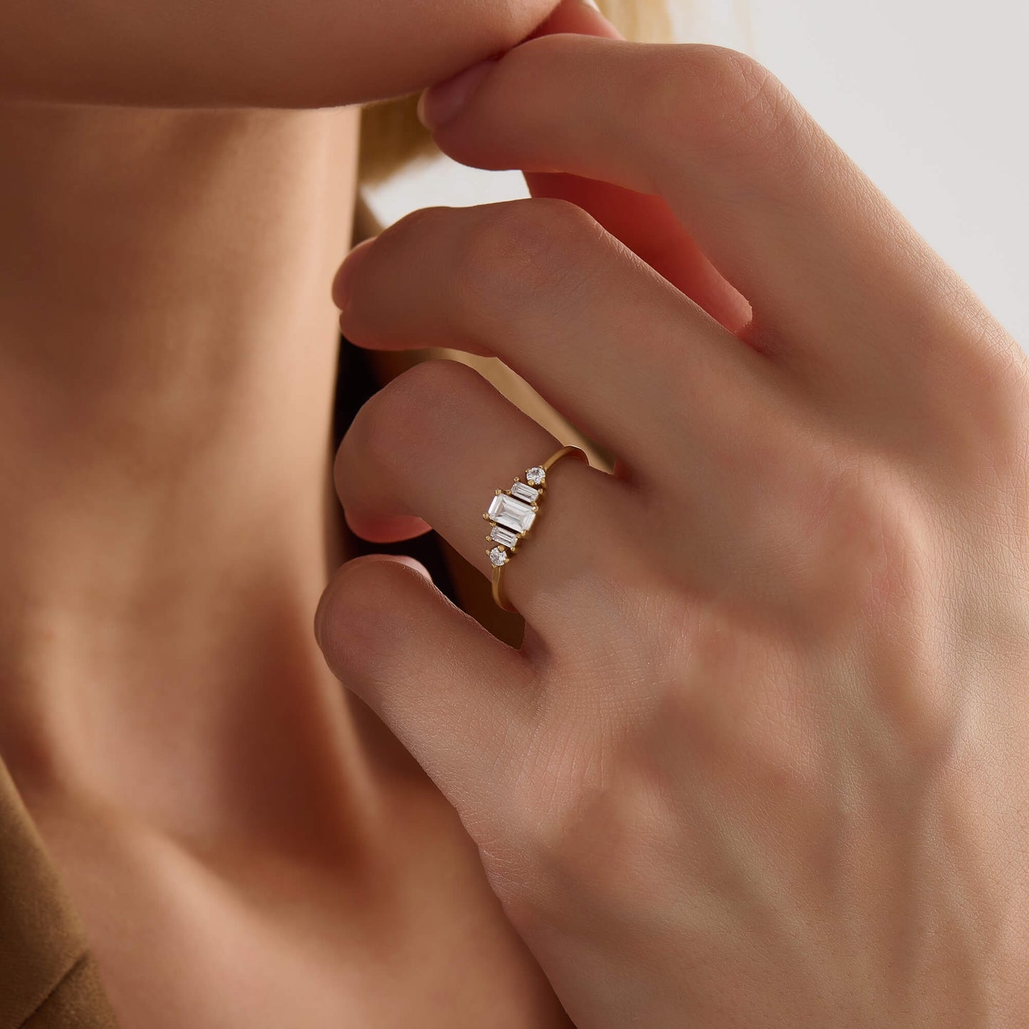 Baguette Diamond Three Stone Ring in Gold