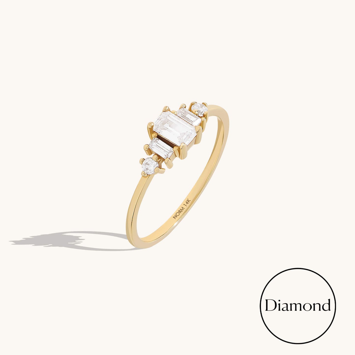 Baguette Diamond Three Stone Ring in Gold