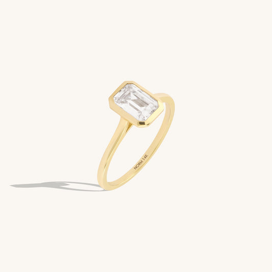 Bezel Set Moissanite Engagement Ring in Gold