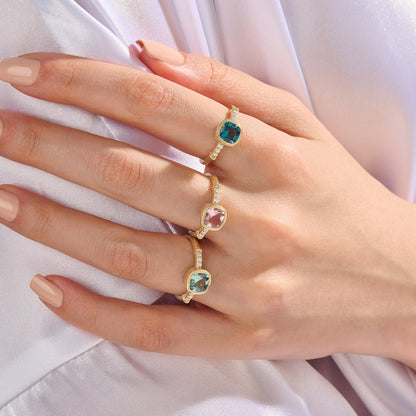 Cushion Blue Topaz Solitaire Ring in Gold