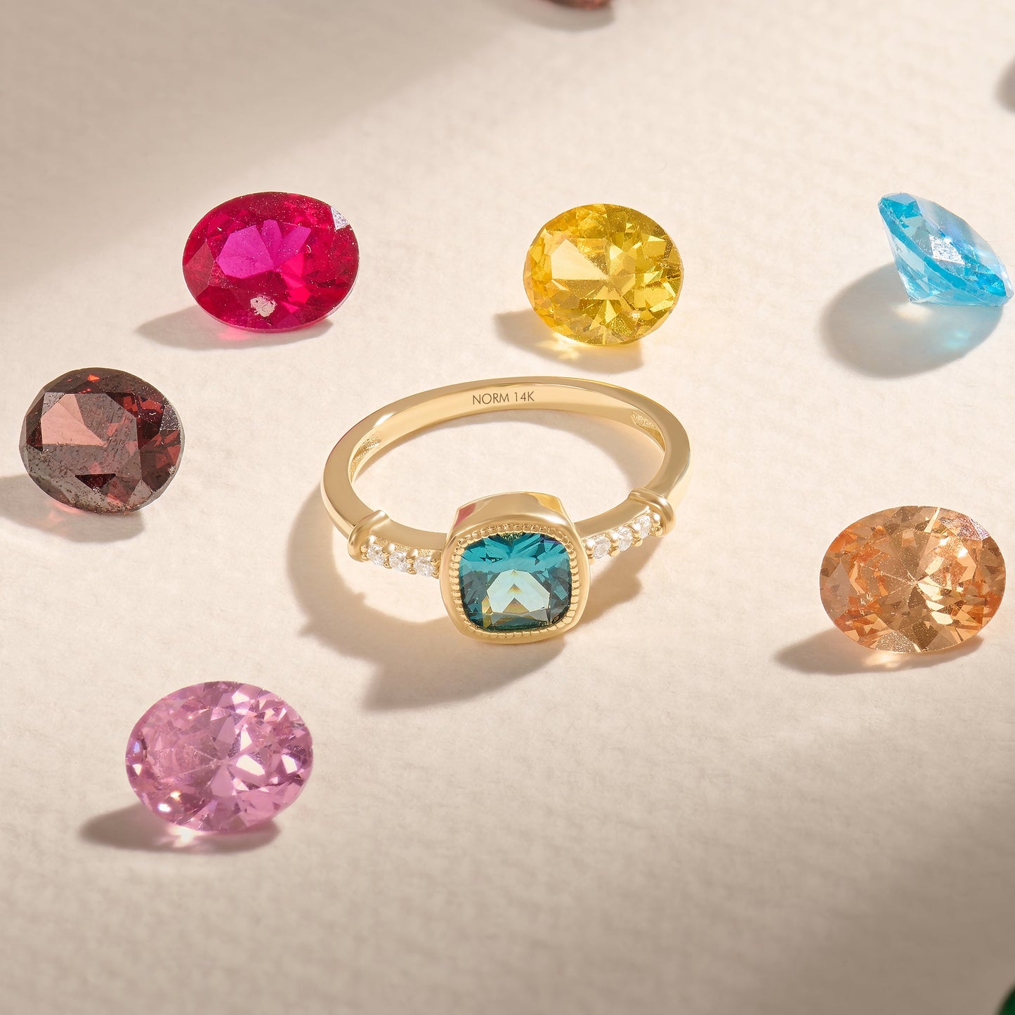 Cushion Blue Topaz Solitaire Ring in Gold