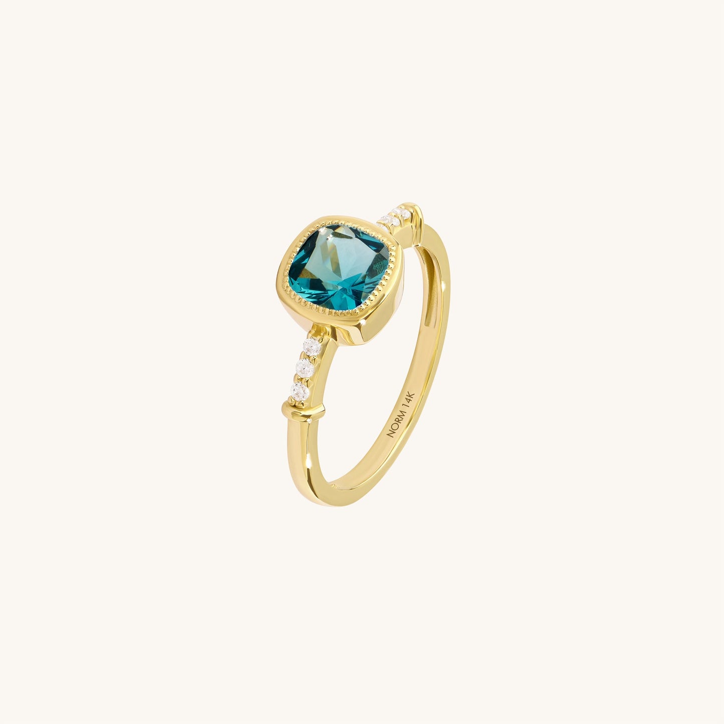 Cushion Blue Topaz Solitaire Ring in Gold