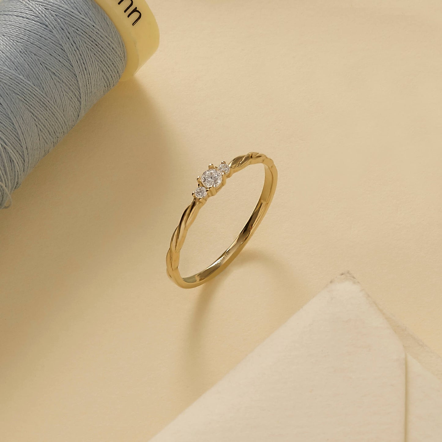 Diamond Minimal Twisted Solitaire Ring in Gold