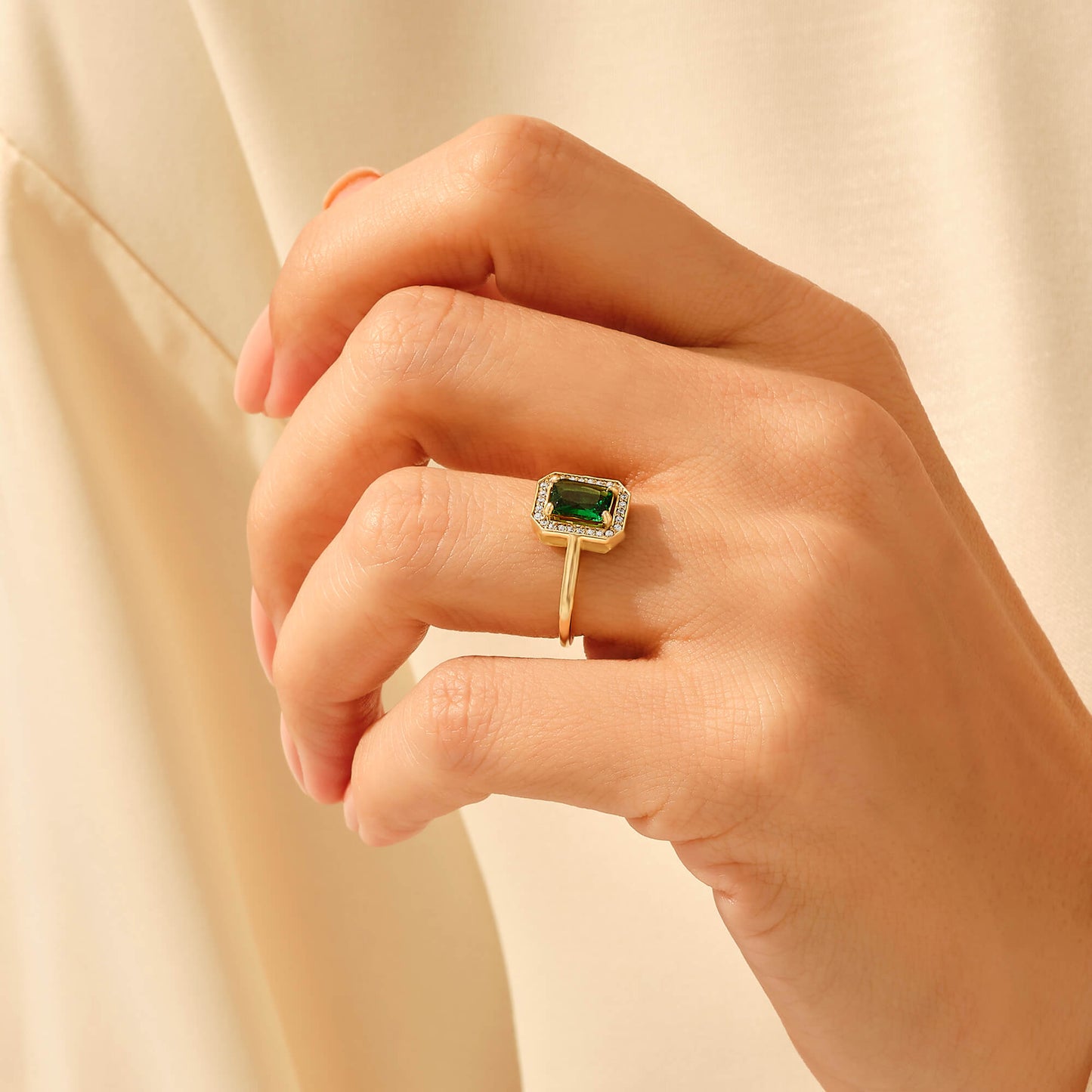 Emerald Halo Engagement Ring in Gold