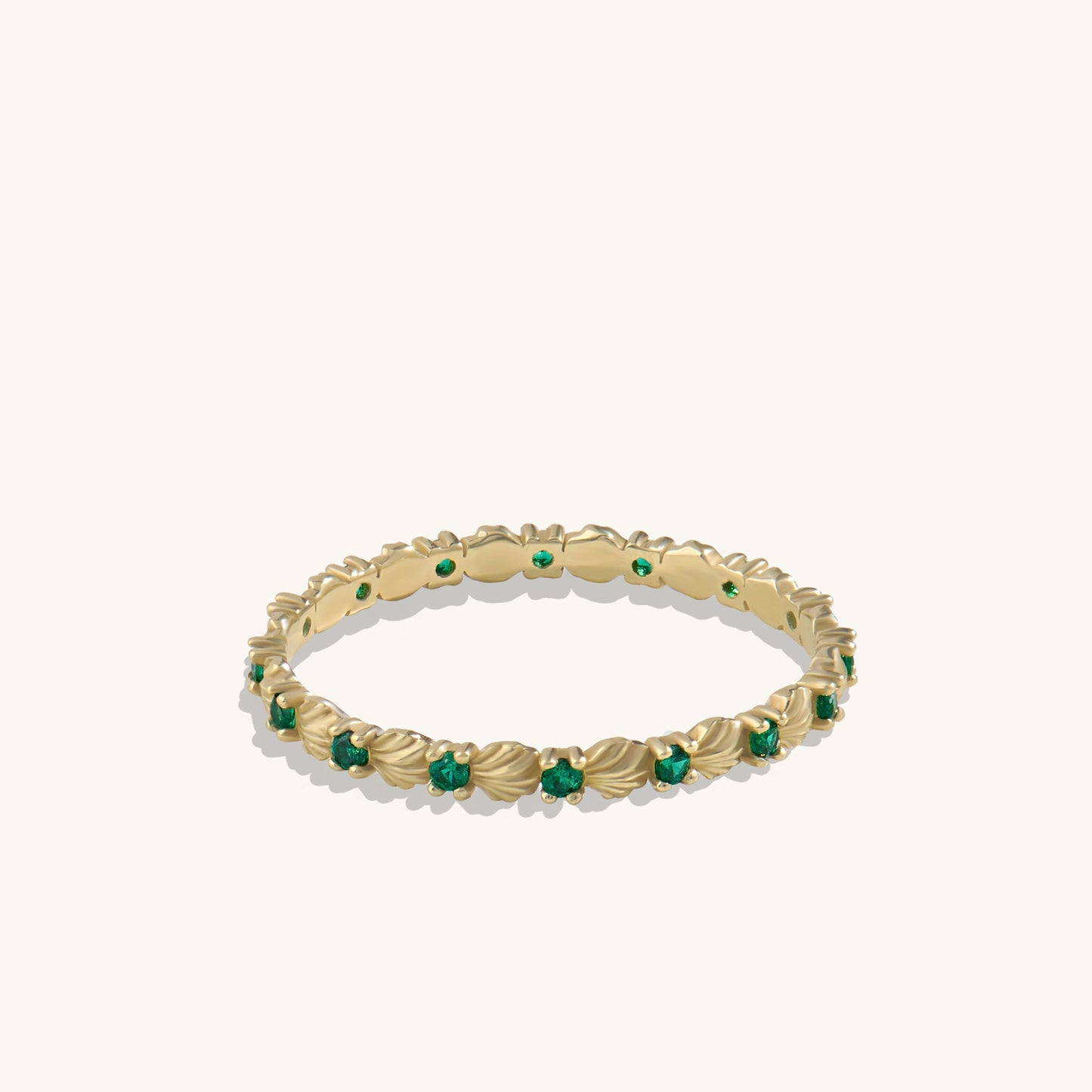 Emerald Seashell Eternity Ring in Gold