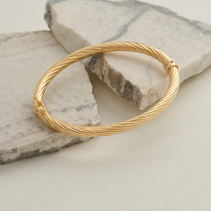 Hinged Twist Bangle Bracelet in Gold