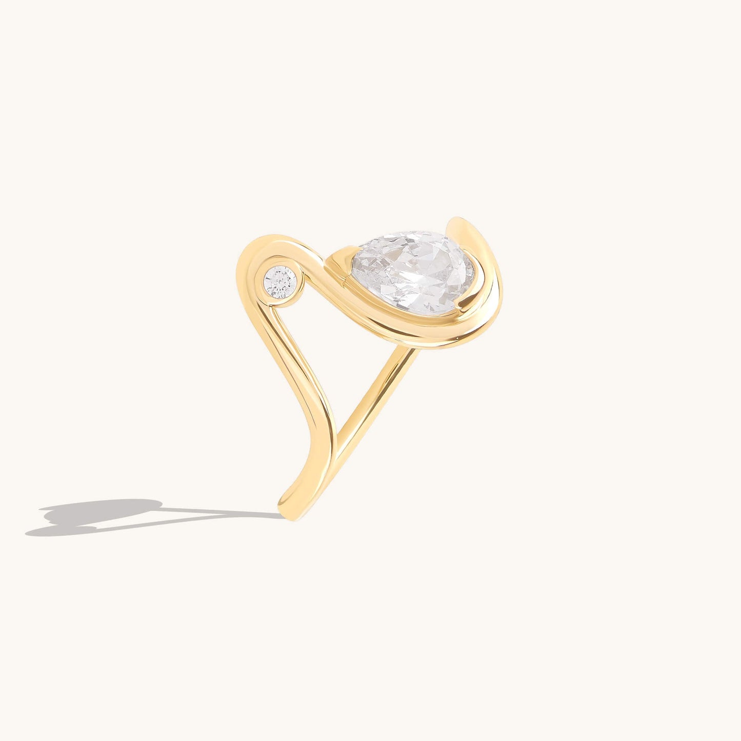 Moissanite Pear Solitaire Swirl Ring in Gold