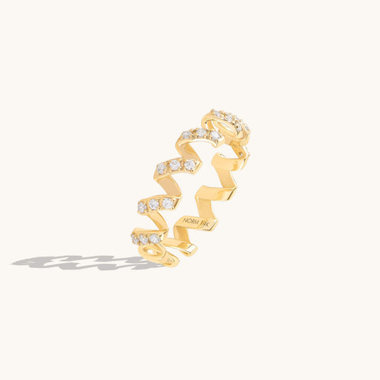 Moissanite Twirl Ring in Gold