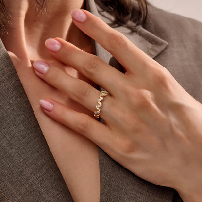 Moissanite Twirl Ring in Gold