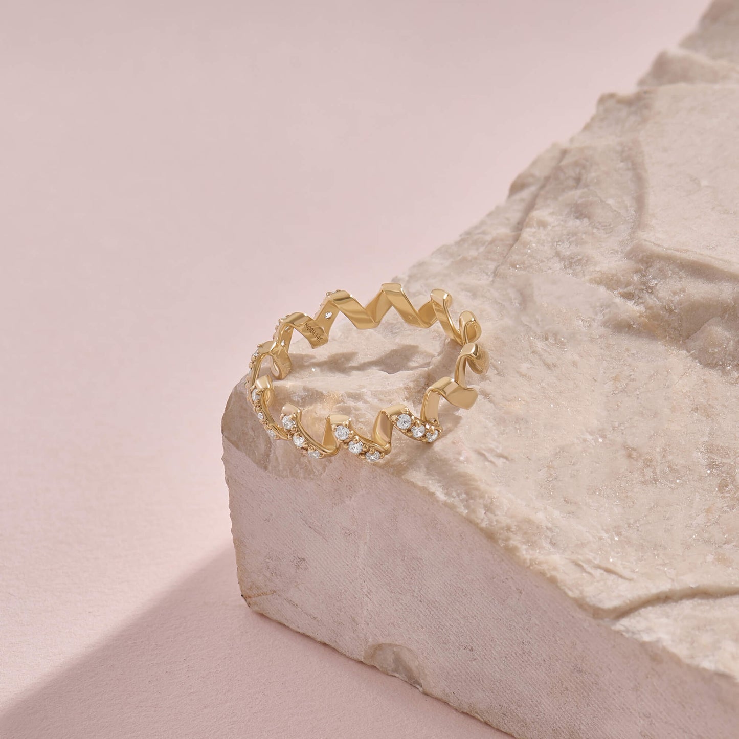 Moissanite Twirl Ring in Gold