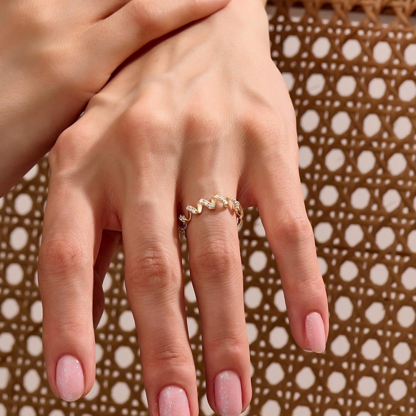 Moissanite Twirl Ring in Gold