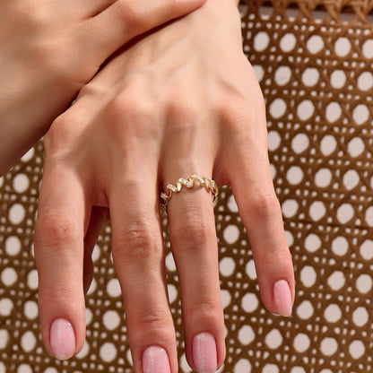 Moissanite Twirl Ring in Gold