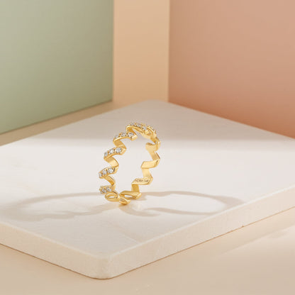 Moissanite Twirl Ring in Gold