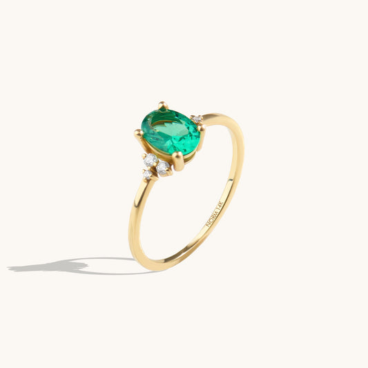 Oval Emerald Engagement Ring in Gold