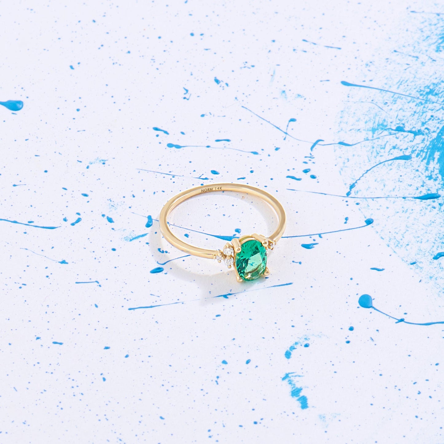 Oval Emerald Engagement Ring in Gold