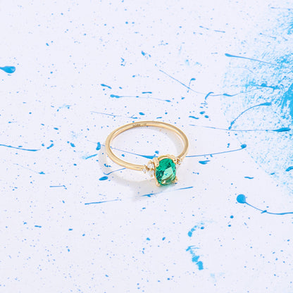 Oval Emerald Engagement Ring in Gold