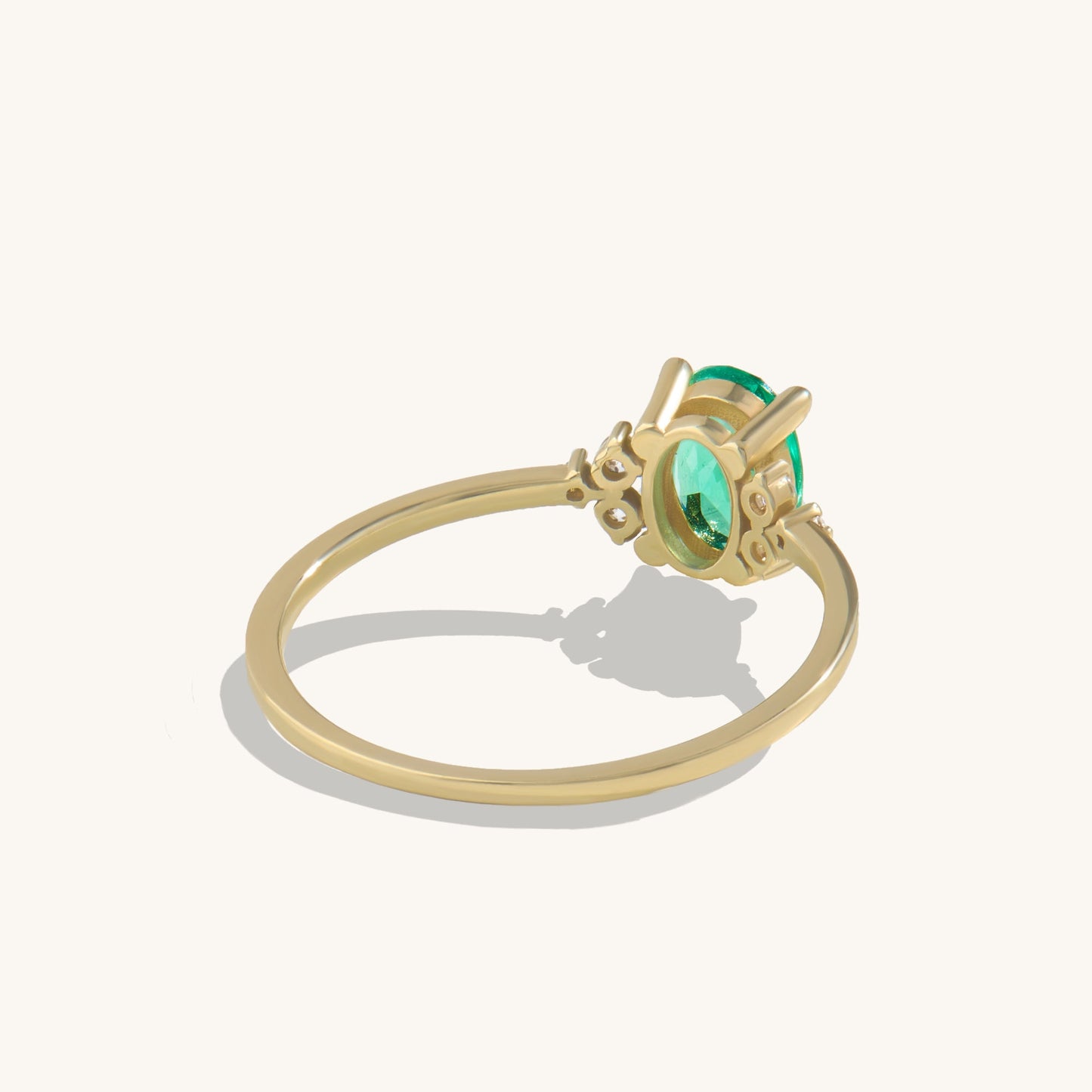 Oval Emerald Engagement Ring in Gold