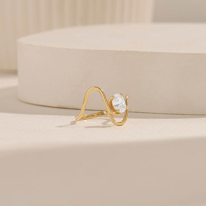Oval Moissanite Solitaire Swirl Ring in Gold