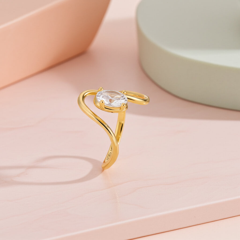 Oval Moissanite Solitaire Swirl Ring in Gold