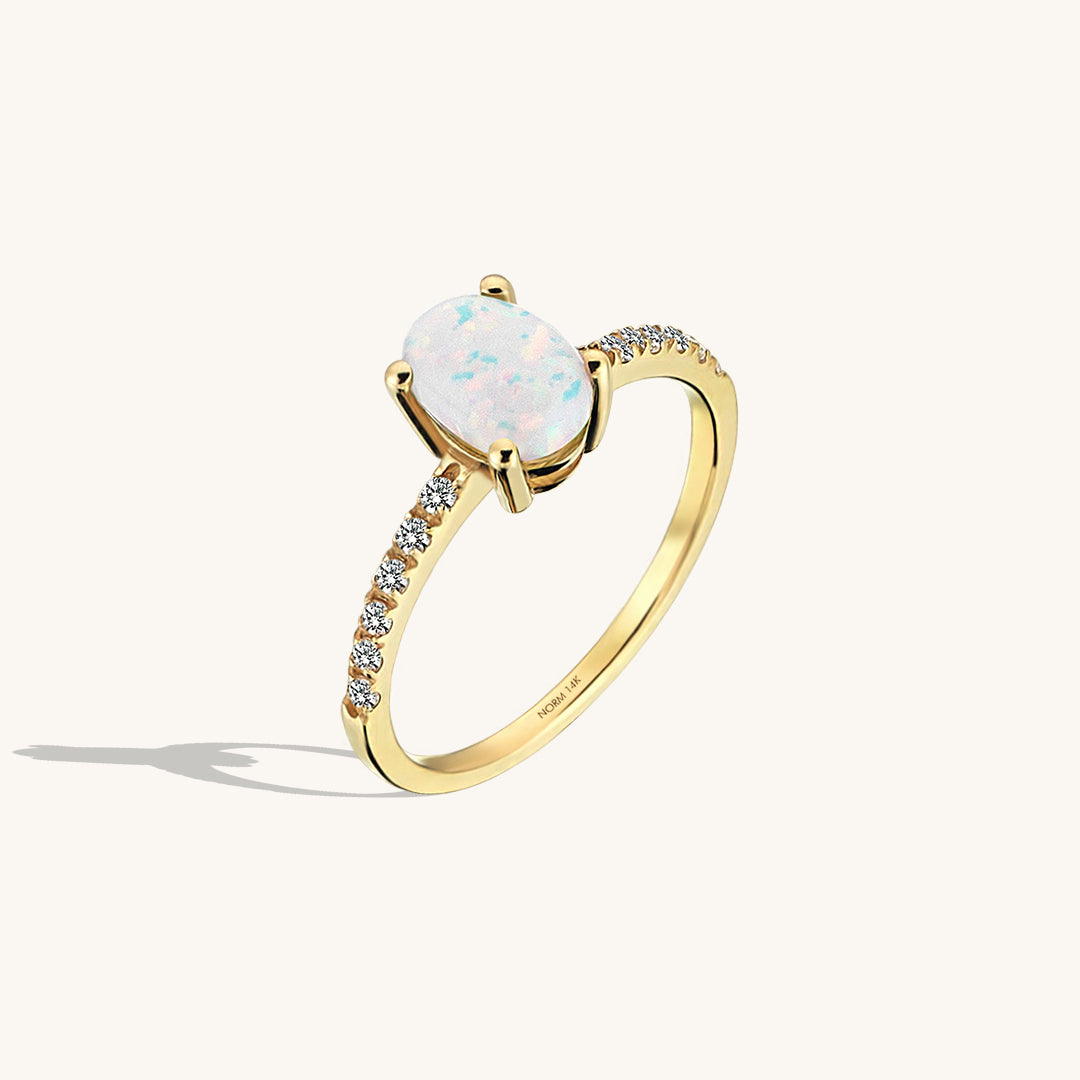 Oval Opal Solitaire Ring in Gold