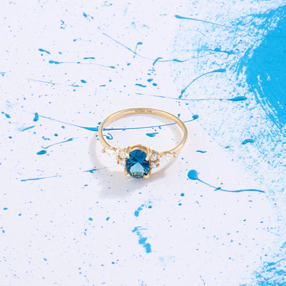 Oval Sapphire Engagement Ring in Gold