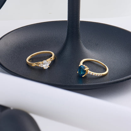 Oval Sapphire and Diamond Solitaire Ring in Gold