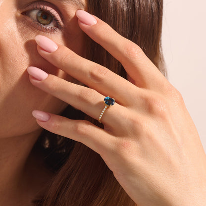 Oval Sapphire and Diamond Solitaire Ring in Gold