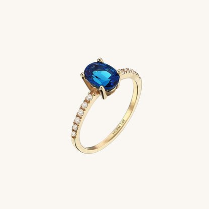 Oval Sapphire and Diamond Solitaire Ring in Gold