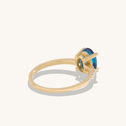 Oval Sapphire and Diamond Solitaire Ring in Gold