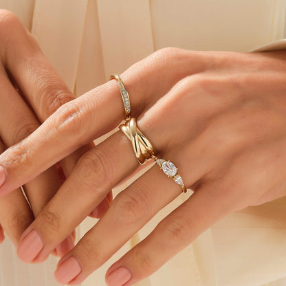 Oval Trilogy Engagement Ring in Gold