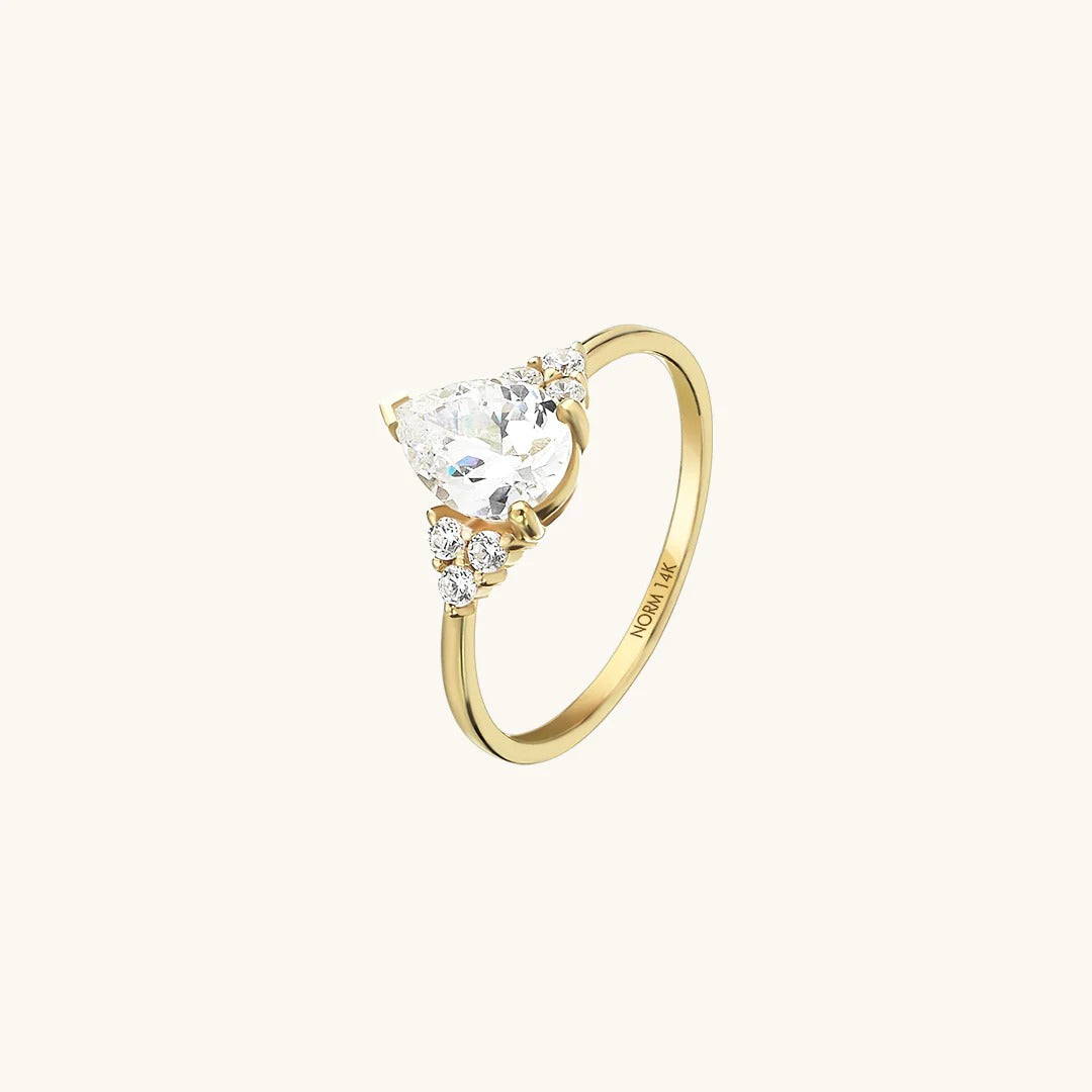 Pear Moissanite Engagement Ring in Gold
