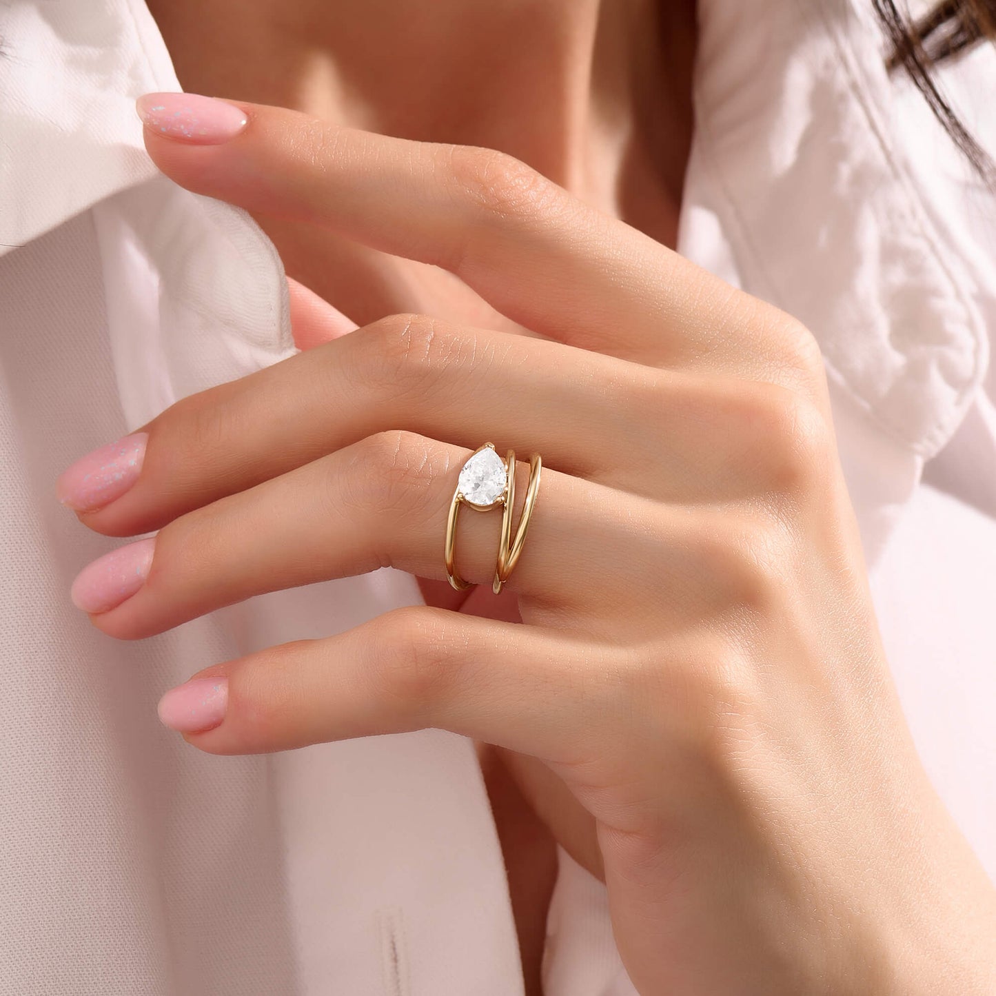 Pear Moissanite Solitaire Spiral Ring in Gold