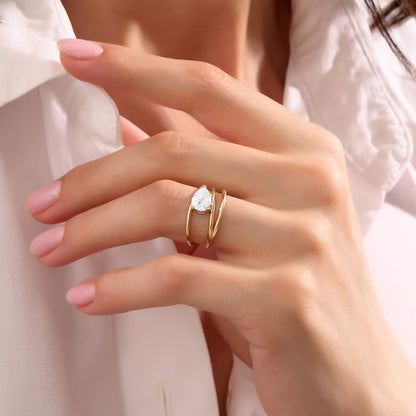 Pear Moissanite Solitaire Spiral Ring in Gold