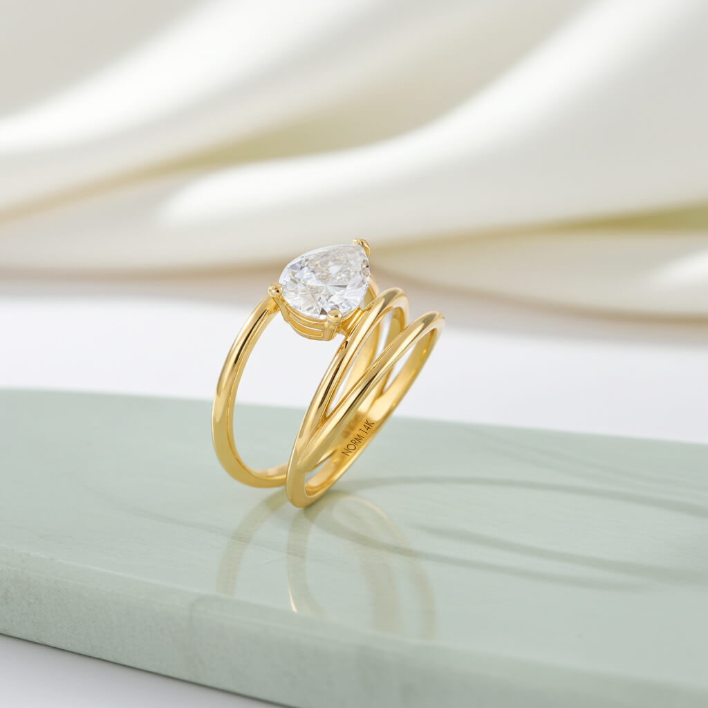 Pear Moissanite Solitaire Spiral Ring in Gold