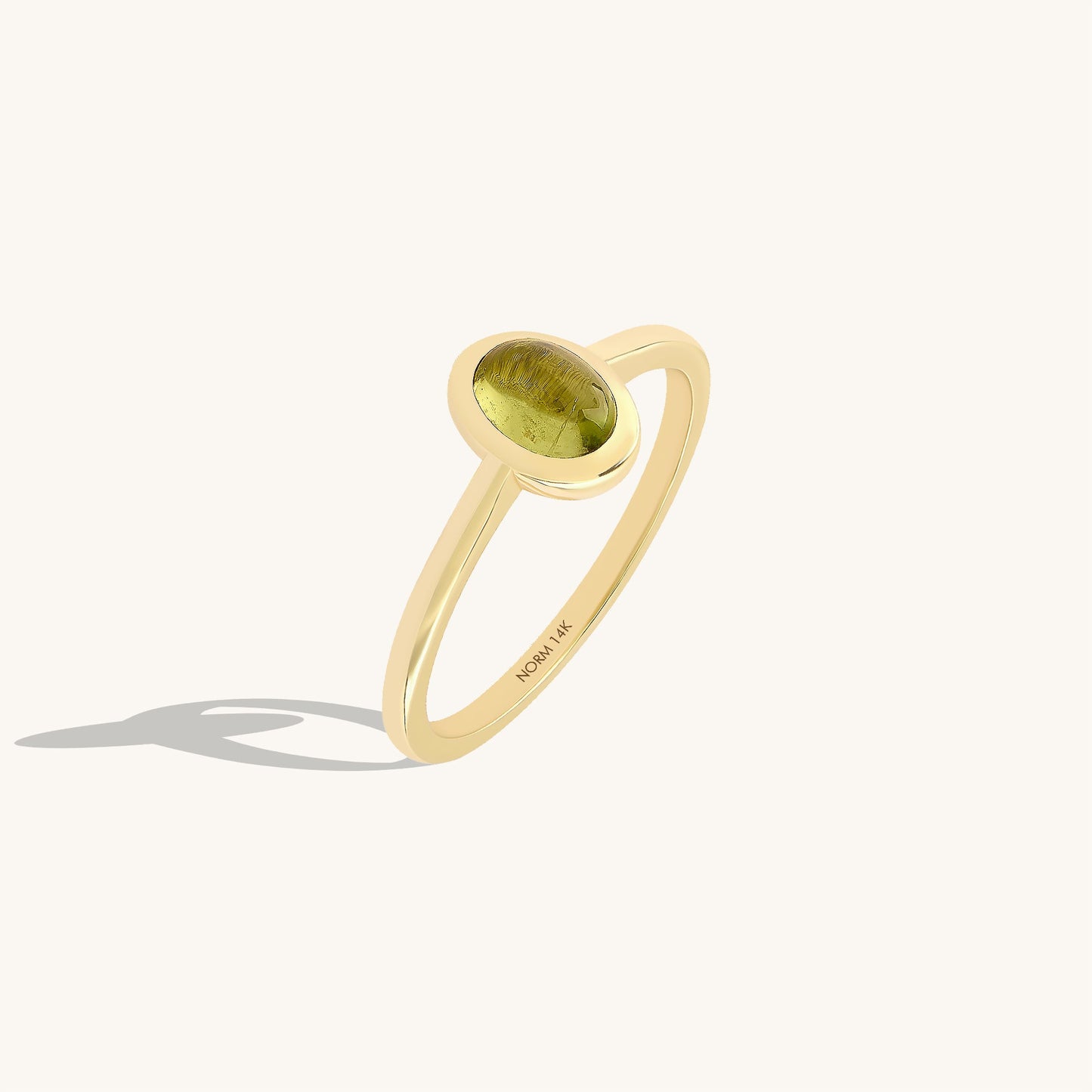 Peridot Bezel Solitaire Ring in Gold