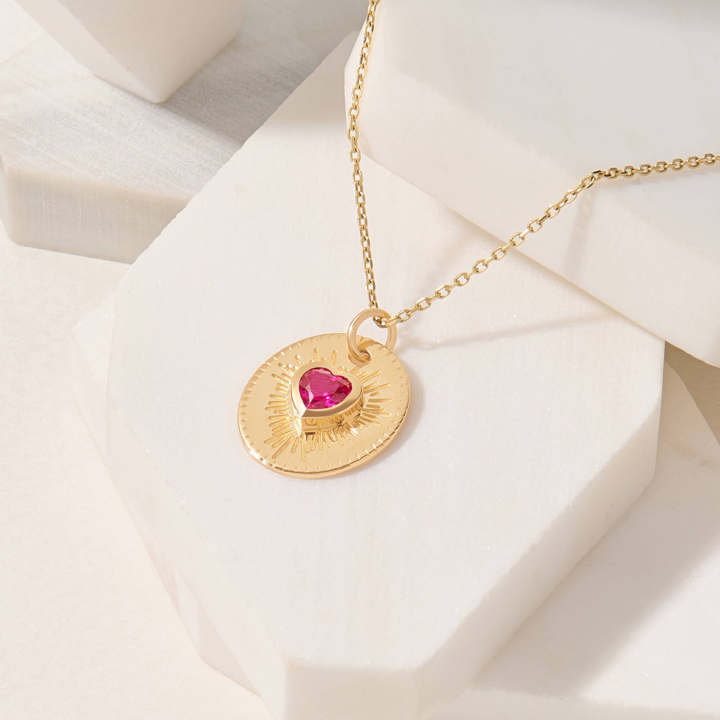 Ruby Heart Sunburst Necklace in Gold