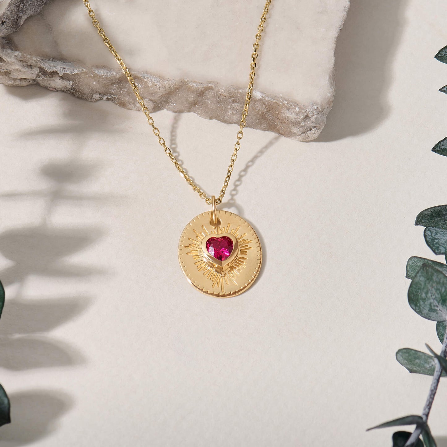 Ruby Heart Sunburst Necklace in Gold