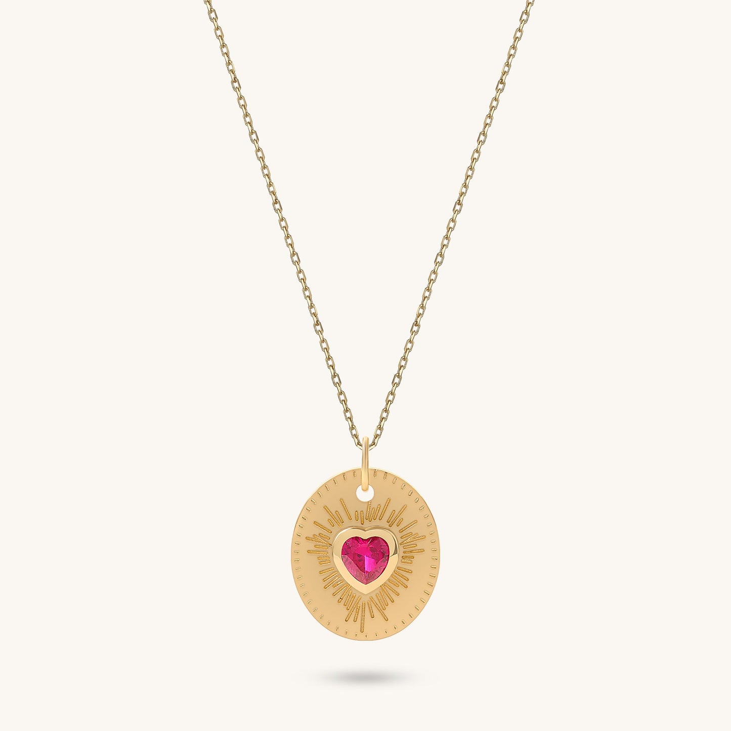 Ruby Heart Sunburst Necklace in Gold