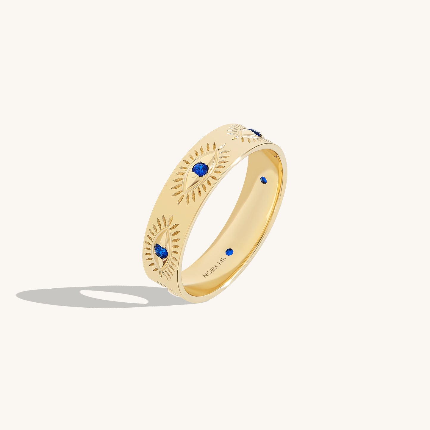 Sapphire Evil Eye Band Ring in Gold