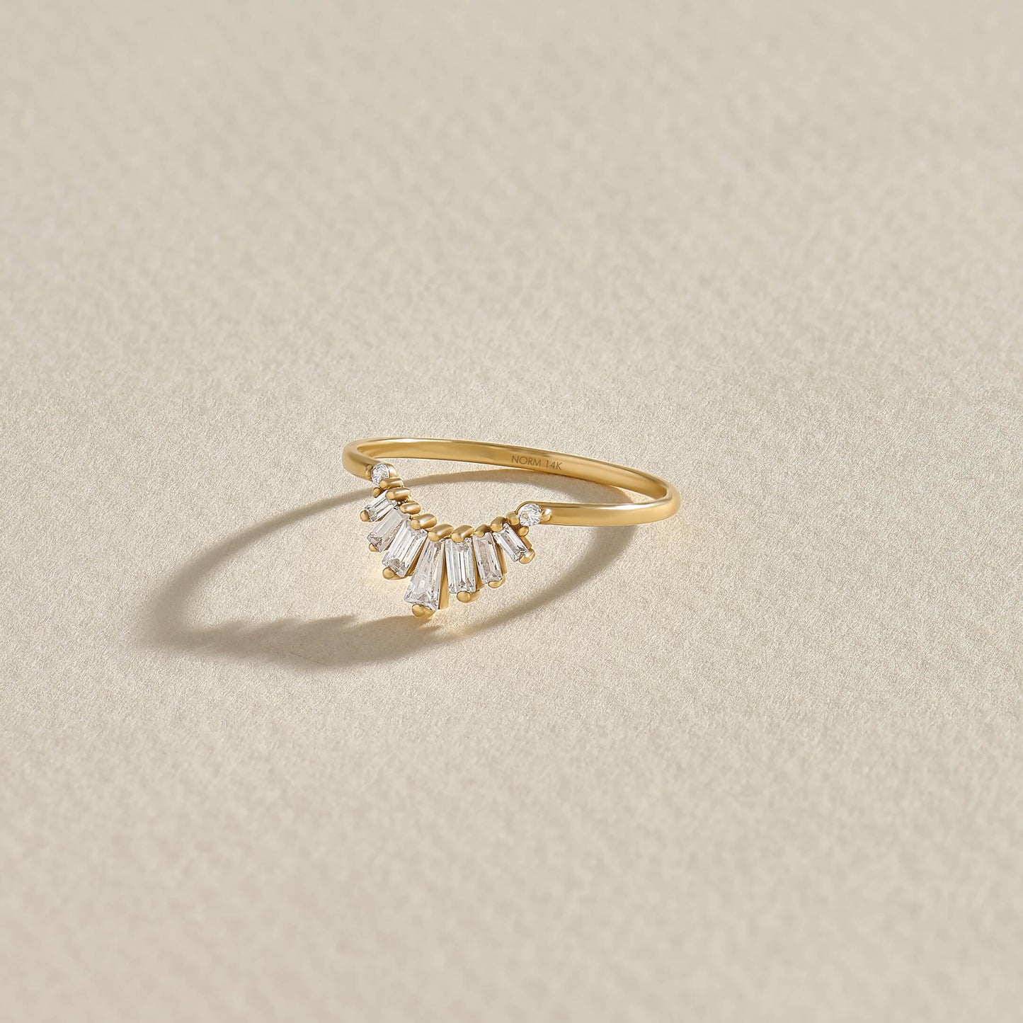 Sunburst Tapered Baguette Curved Ring in Gold