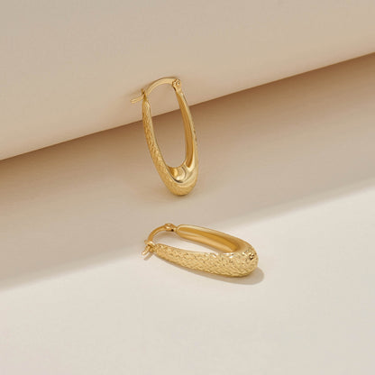 Textured Elongated Hoop Earrings in Gold