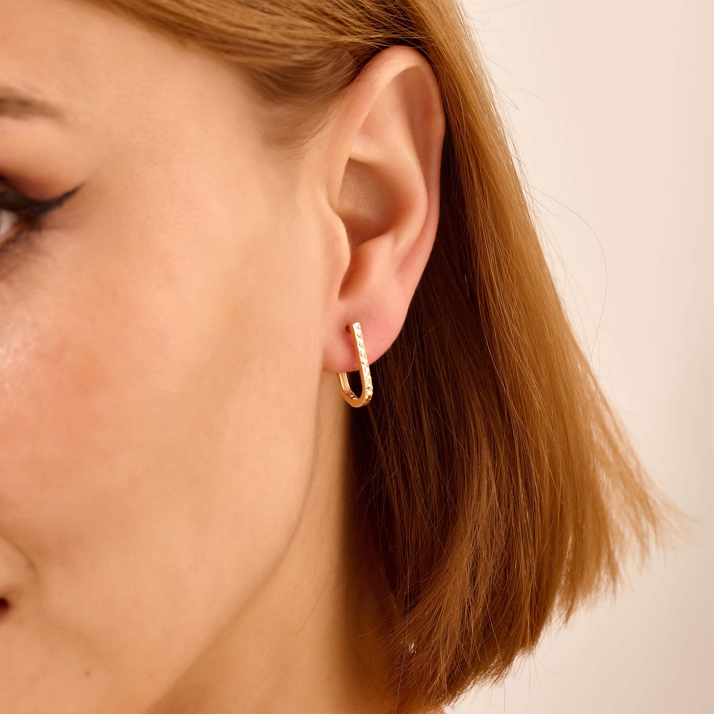 Textured U-Link Huggie Earrings in Gold