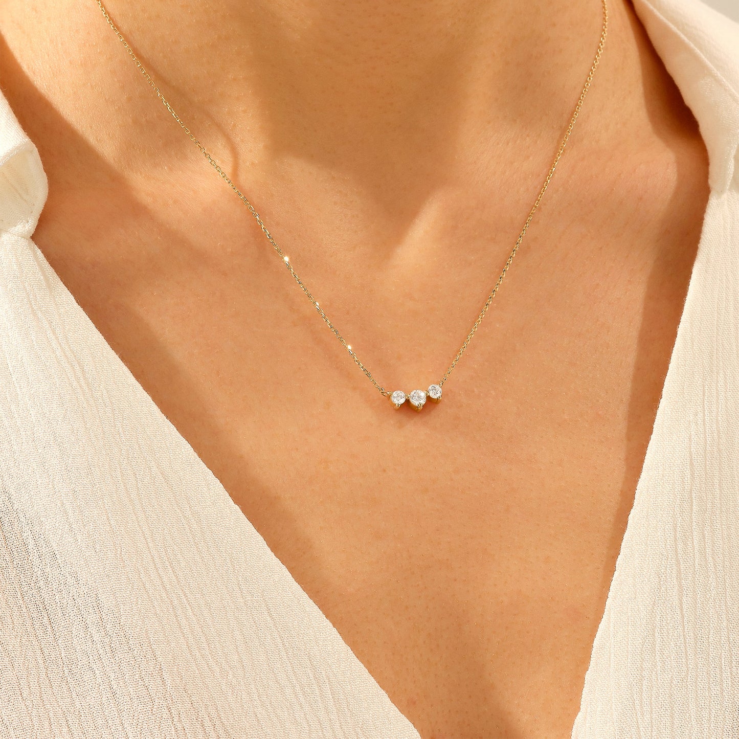 Triple Solitaire Necklace in Gold
