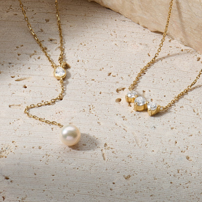 Triple Solitaire Necklace in Gold